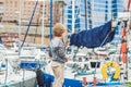 Cute blond boy looking at yachts and sailboats Royalty Free Stock Photo