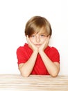 Cute blond boy in the red shirt Royalty Free Stock Photo