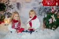 Cute blond children, boy and girl, siblings, posting Christmas letter to Santa Claus, winter day Royalty Free Stock Photo