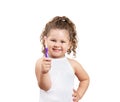 Cute blond girl brushing her teeth on isolated white background. Royalty Free Stock Photo
