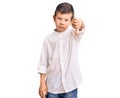 Cute blond kid wearing elegant shirt looking unhappy and angry showing rejection and negative with thumbs down gesture