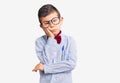 Cute blond kid wearing nerd bow tie and glasses thinking looking tired and bored with depression problems with crossed arms Royalty Free Stock Photo