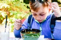 Child eating a soup Royalty Free Stock Photo