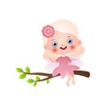 Cute blonde fairy girl in pink dress stay on tree branch