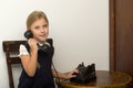 Cute blonde girl talking on vintage telephone Royalty Free Stock Photo