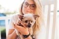 Cute blonde and her Yorkshire Terrier