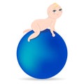 Cute infant lies on the fit ball