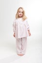 Cute blonde kid in her pajamas Royalty Free Stock Photo