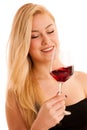 Cute blonde woman drinks a glass of red wine isolated over white Royalty Free Stock Photo