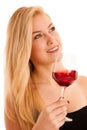 Cute blonde woman drinks a glass of red wine isolated over white Royalty Free Stock Photo