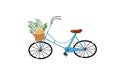 Cute blue bicycle with basket full of breads and plants