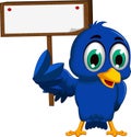 Cute blue bird cartoon holding blank board Royalty Free Stock Photo