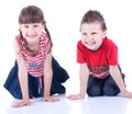 Cute blue-eyed boy and girl posing in the studio Royalty Free Stock Photo
