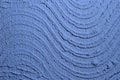 Blue weathered wavy paint on wall texture - fantastic abstract photo background