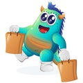 Cute blue monster happy shopping Royalty Free Stock Photo