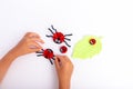 Cute bottle cap ladybugs, spring craft, creative ideas, DIY kids craft using plastic bottle cap Royalty Free Stock Photo