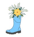 Cute bouquet in blue rubber boots. Gardening boot with flowers. Spring Concept Royalty Free Stock Photo