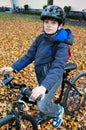 Cute boy on bicycle