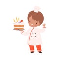 Cute Boy with Birthday Cake Dessert, Cute Little Chef Character in Uniform Cooking in the Kitchen Cartoon Style Vector Royalty Free Stock Photo