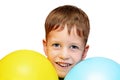 Cute boy with blue and yellow balloons isolated on Royalty Free Stock Photo