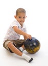 Cute boy with bowling ball Royalty Free Stock Photo