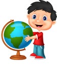 Cute boy cartoon looking at globe