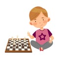 Cute Boy Character Sitting and Playing Chess Vector Illustration Royalty Free Stock Photo