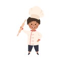 Cute Boy Chef Cook with Rolling Pin, Smiling Kid in Chef Uniform Cooking in Kitchen Cartoon Style Vector Illustration Royalty Free Stock Photo