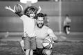 Cute boy with dad playing basketball. Dad and child spending time together. Father and son play outdoor. Royalty Free Stock Photo