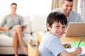 Cute boy doing his homework Royalty Free Stock Photo