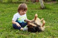 Cute Boy With Down Syndorme Playing With His Dog. Best Friends, Concept