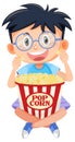 Cute boy eating popcorn Royalty Free Stock Photo