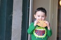 Cute Boy Enjoying a Cookie Royalty Free Stock Photo
