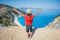 Cute boy enjoying the view of Beautiful Exotic Myrtos Beach in Kefalonia, Greece Royalty Free Stock Photo