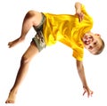 Cute boy exercising, dancing and jumping over white Royalty Free Stock Photo