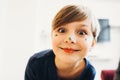 A cute boy with a face painted like a clown Royalty Free Stock Photo