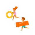 Cute boy and girl, children running on the beach with inflatable floats