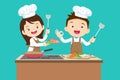 Cute Boy and Girl cooking in the kitchen. happy little chef kids Royalty Free Stock Photo