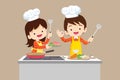 Cute Boy and Girl cooking in the kitchen. happy little chef kids