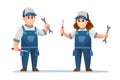 Cute boy and girl technician character holding spanner and screwdriver Royalty Free Stock Photo
