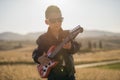 Cute boy with a guitar Royalty Free Stock Photo