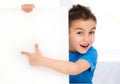 Cute boy is holding blank banner Royalty Free Stock Photo