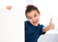 Cute boy is holding blank banner Royalty Free Stock Photo