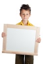 Cute boy holding white board