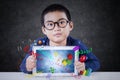 Cute boy holds tablet with formula Royalty Free Stock Photo