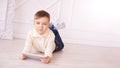 Cute boy playing Computer tablet and chat on floor Royalty Free Stock Photo