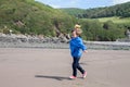 Cute boy with kite on the beach Royalty Free Stock Photo