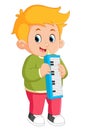 a cute boy is learning a song by playing a melodian musical instrument Royalty Free Stock Photo