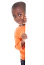 Cute boy looking around corner Royalty Free Stock Photo