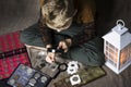 Cute boy numismatist collects old coins Royalty Free Stock Photo